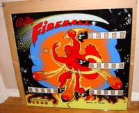 Image # 59225: Fireball NOS Backglass 
(This glass was described to us as New Old Stock. It was packed in its carton with Chicago newspaper dated 1974.)