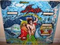 Image # 58458: Flash Prototype Blue Backglass 
(The sky is blue, not black. The designer autographed the upper left corner.)