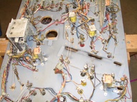 Image # 49155: Flight 2000 Under Middle Playfield 
(In this view, some hardware has been removed. Serial number 598. Edge of playfield dated 'June 12, 1980'.)