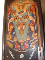 Image # 7871: Flying Saucers Playfield 
(This game has after-factory painted rails, apron, and ball arch but is presented here to show the white pop bumper cap not seen in other images.)