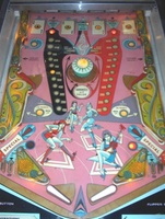 Image # 9147: 4 Aces Playfield 
(Note that this playfield shows a pop bumper where the flyer shows a spinner in the center of the playfield.)