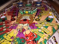 Image # 64602: 4 Roses Playfield 
(This playfield is original condition. Only the rubbers, bulbs, bulb sockets, and bumper skirts have been replaced.)