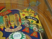 Image # 23504: 4 Star Playfield - Detail 
(The pop bumper cap in this image is not original to this game.)