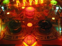 Image # 46781: Arrowhead Insert is Red 
(Photographed at the 2010 Pacific Pinball Expo.)