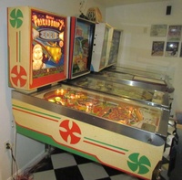 Image # 52508: Friendship &quot;7&quot; Cabinet - Left 
(The game shown here has a reproduction backglass but is included to show its other features.)