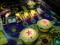 Image # 35978: Galaxy Upper Right Playfield 
(The design on the spinning target does not match the one shown on the manufacturer flyer.)